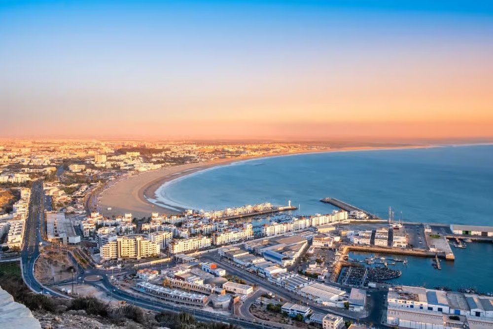 Panoramic view of Agadir Bay and sandy beach at sunset